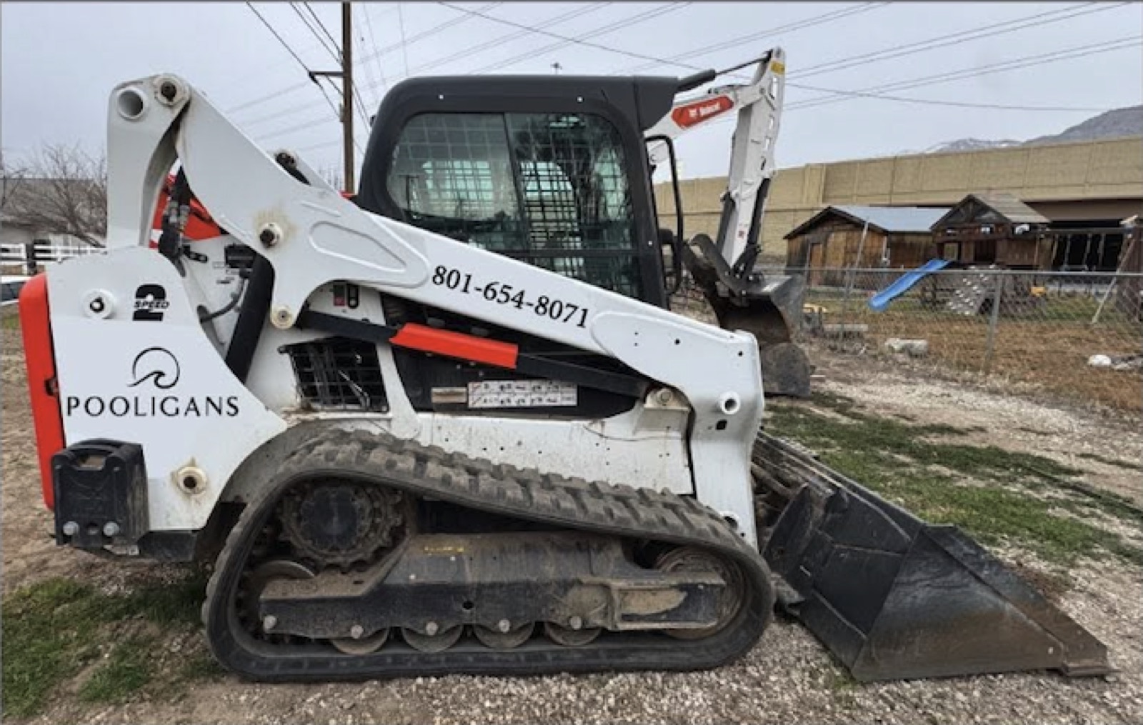 Bobcat skid steer with custom decals