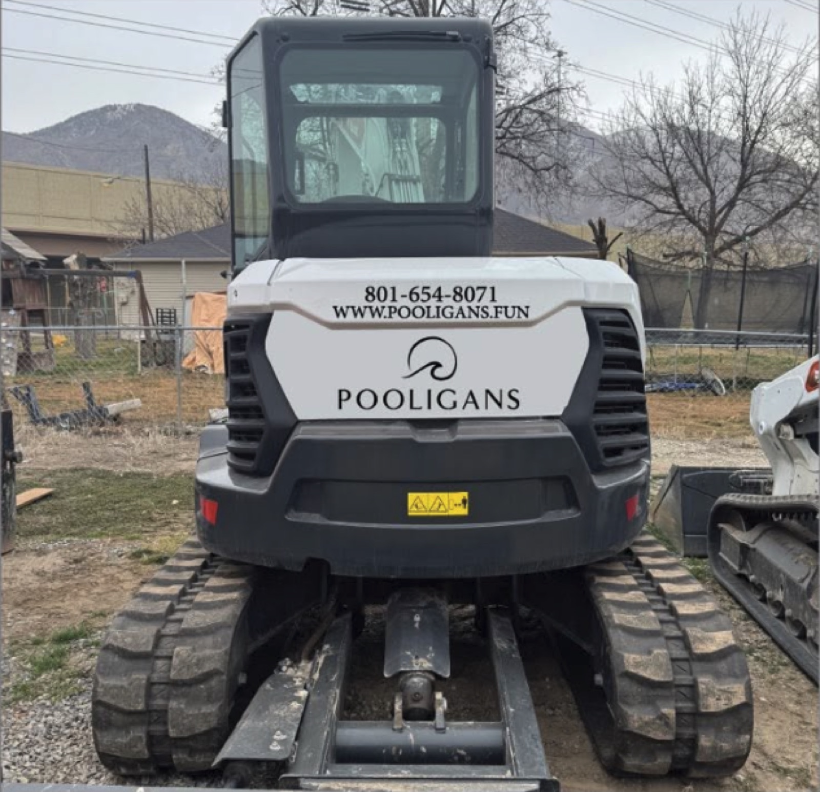 Mini excavator — Decals on curved panels, by Quick Time Designs, Tooele Utah