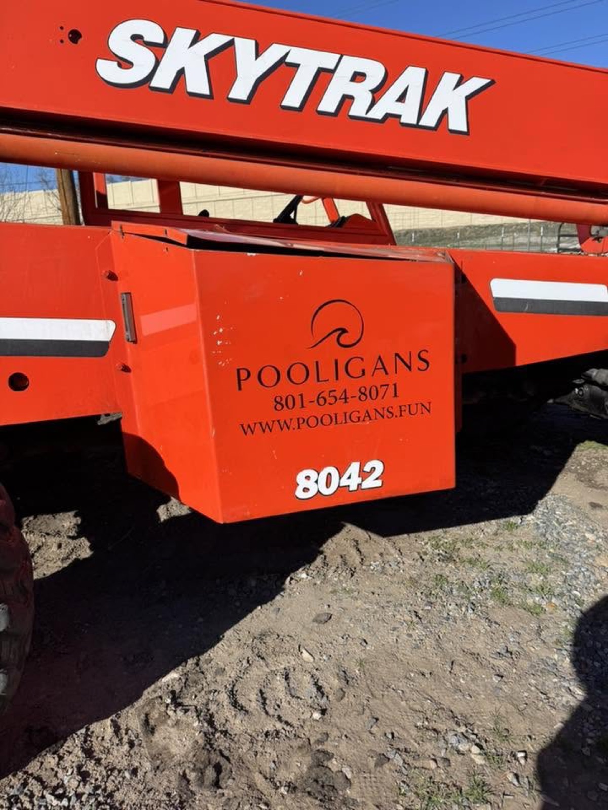 SkyTrak telehandler with Pooligans decals — heavy equipment graphics by Quick Time Designs